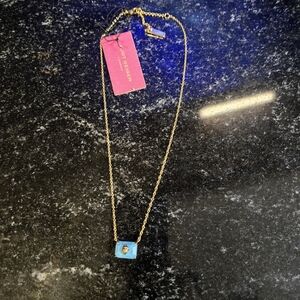 Kurt Geiger Gold Necklace with Blue Pendant